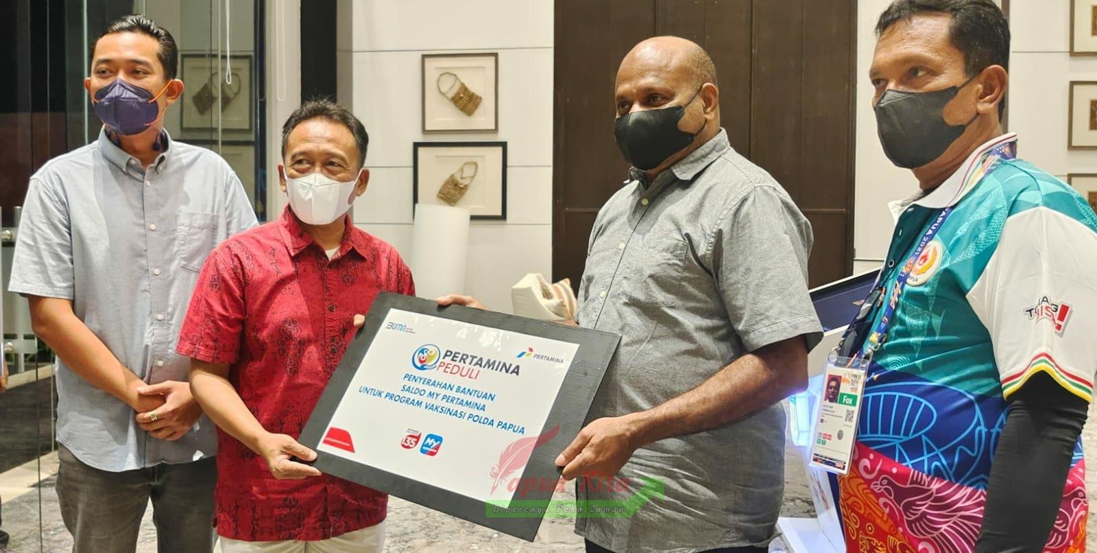 Penyerahan Saldo mypertamina dalam rangka mendukung program vaksinasi Covid-19 nasional yang dilaksanakan oleh Polda Papua